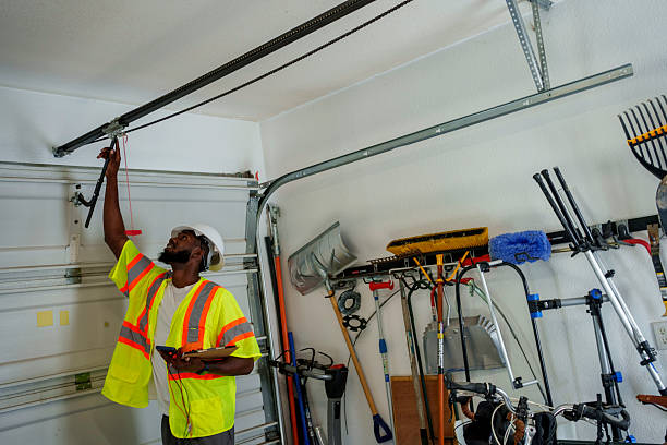 Professional Garage Door Roller Replacement technician working in Lincoln Center, KS